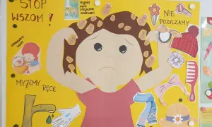 Plakat w przedszkolu: "STOP WSZOM!". Dzieci uczą się o higienie, sprawdzaniu włosów i myciu rąk, by zapobiegać wszawicy.